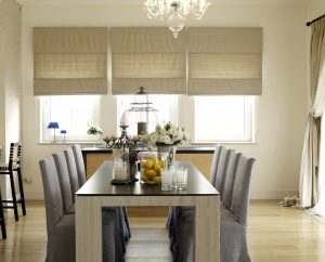 beige roman blinds in a modern dining room