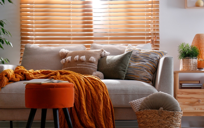 Autumnal themed living room with wooden shutters