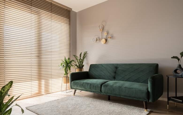 bespoke blinds in cream Venetian inside a warmly decorated living room.