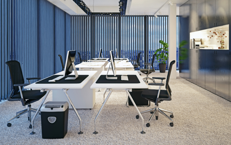 A modern office interior with vertical blinds. 