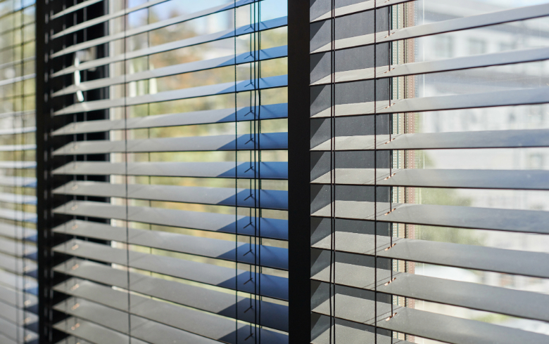 A close-up of modern wooden Venetian blinds.
